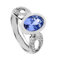 Pierścionek z białego złota z tanzanitem zakutym na gładko