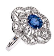 Pierścionek z białego złota w formie rozety z szafirem