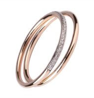 Zestaw dwóch pierścionków typu ring z różowego złota z brylantami